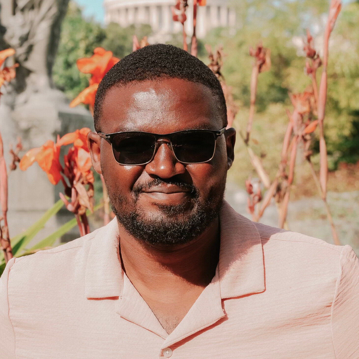 Portrait of Dennis Muticia, Senior Software Engineer & AI Researcher.
